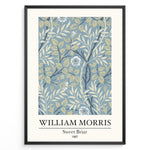 Load image into Gallery viewer, William Morris Sweet Briar 1887 botanical floral pattern art print with blue and beige leaves and flowers in black frame plakat.
