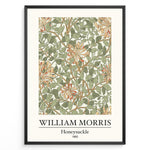 Load image into Gallery viewer, Framed William Morris Honeysuckle 1885 art print plakat featuring intertwining green leaves and orange honeysuckle flowers on a cream background.
