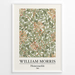 Load image into Gallery viewer, Framed William Morris Honeysuckle 1885 art print plakat featuring intertwining green leaves and orange honeysuckle flowers on a cream background.
