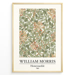 Load image into Gallery viewer, Framed William Morris Honeysuckle 1885 art print plakat featuring intertwining green leaves and orange honeysuckle flowers on a cream background.
