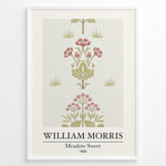 Load image into Gallery viewer, William Morris Meadow Sweet 1858 floral art print plakat featuring pink and green botanical pattern with flowers and leaves in a black frame.
