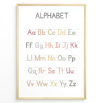 Load image into Gallery viewer, Pastel-colored alphabet poster showing uppercase and lowercase letters arranged on handwriting lines, framed as educational kids’ wall art.
