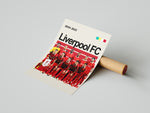 Load image into Gallery viewer, Holdfoto | Liverpool FC fodboldplakat 2024-2025 med røde spillertrøjer og ikonisk klubdesign – en stærk plakat til ægte fans.
