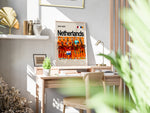Load image into Gallery viewer, Netherlands holdfoto plakat | Hollandsk landshold 2024-2025 i orange hjemmebanetrøjer med holdskjold og stærke udtryk.
